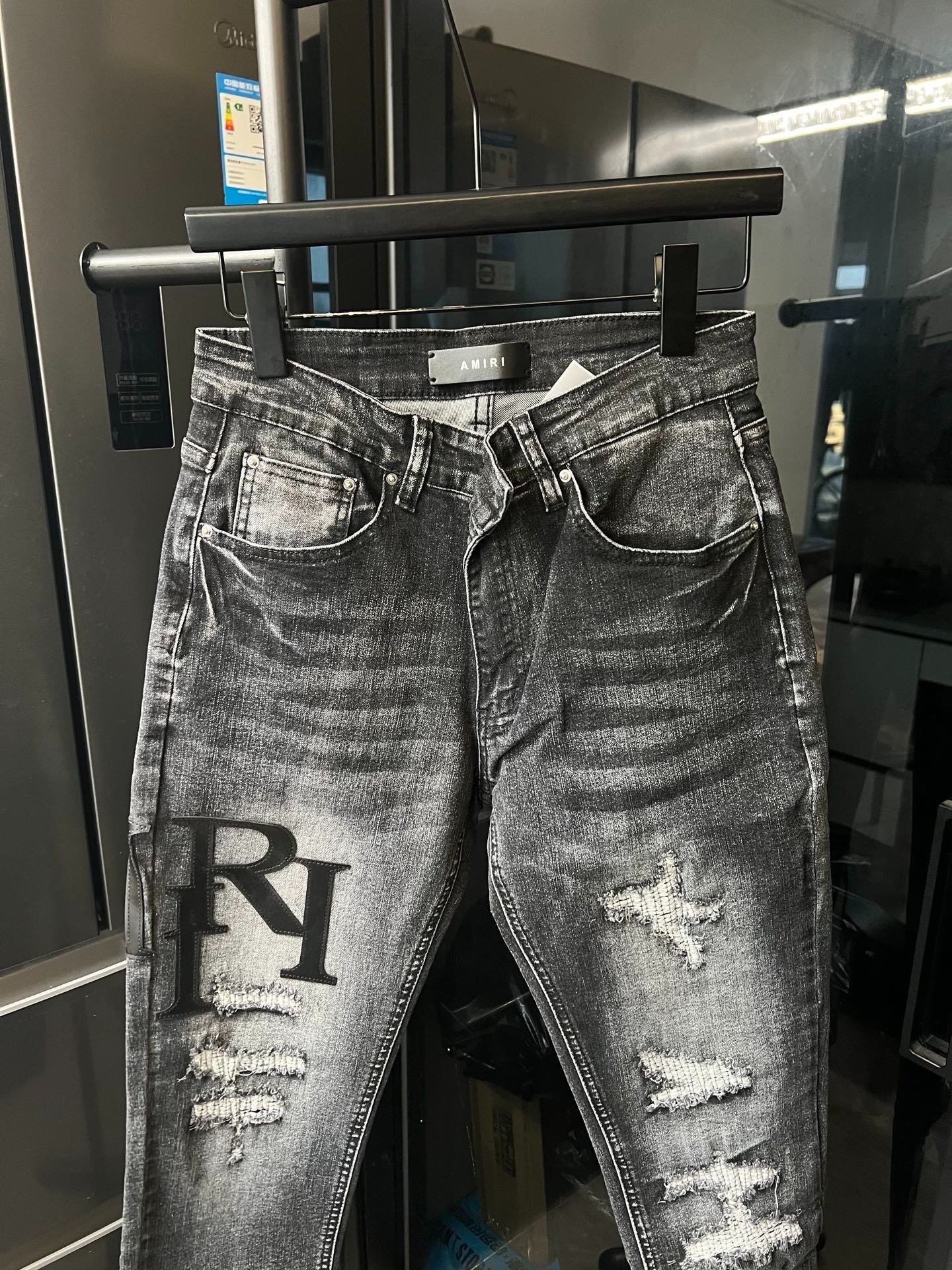 AMIRI Distressed Logo Jeans - Image 4