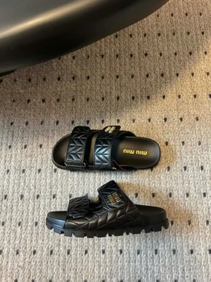 Miu Miu Quilted Leather Platform Slides Zwart