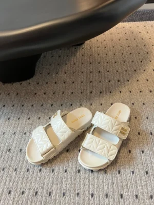 Miu Miu Quilted Leather Platform Slides Wit